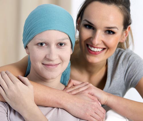 young cancer patient with caregiver